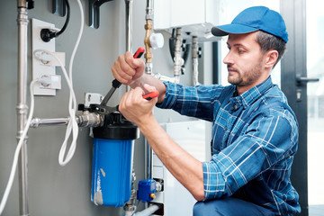 Water Heater Leaking From Bottom? Causes & Fixes